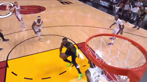 A Basketball Player With The Number 23 On The Back Of His Shirt GIF