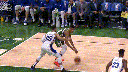 A Basketball Player With The Number 25 On His Back Dribbles The Ball GIF