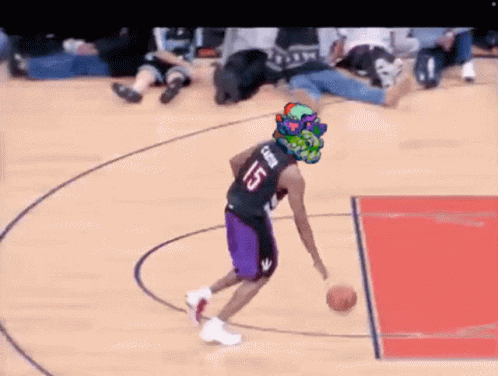 A Basketball Player With The Number 25 On His Jersey Is Dribbling The Ball GIF