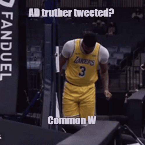A Basketball Player With The Number 3 On His Jersey Stands In A Locker Room GIF