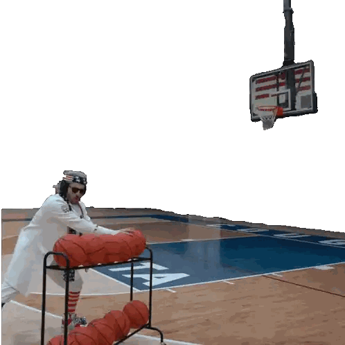 a basketball player with the number 3 on his jersey throws a ball