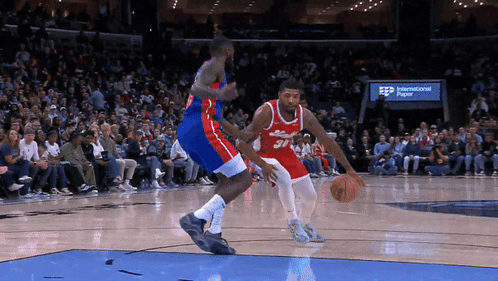 A Basketball Player With The Number 31 On His Jersey Is Dribbling The Ball GIF
