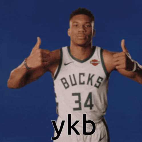 A Basketball Player With The Number 34 On His Jersey Gives Two Thumbs Up GIF