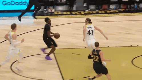 A Basketball Player With The Number 41 On His Back GIF