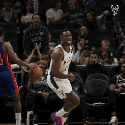 A Basketball Player With The Number 43 On His Jersey Is Celebrating GIF