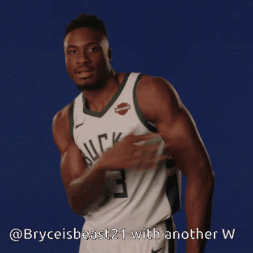 A Basketball Player With The Number 43 On His Jersey Is Smiling GIF