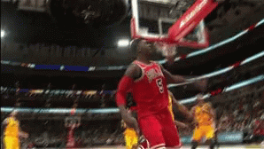 A Basketball Player With The Number 5 On His Jersey Jumps Into The Air GIF