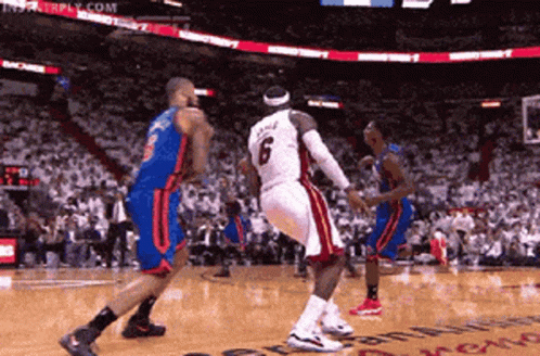 A Basketball Player With The Number 6 On His Jersey Is Jumping In The Air GIF