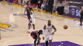 A Basketball Player With The Number 6 On His Shorts Dribbles The Ball GIF