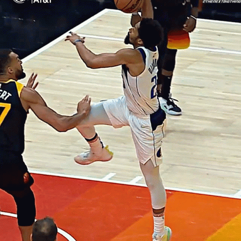 A Basketball Player With The Number 7 On The Back Of His Shirt GIF