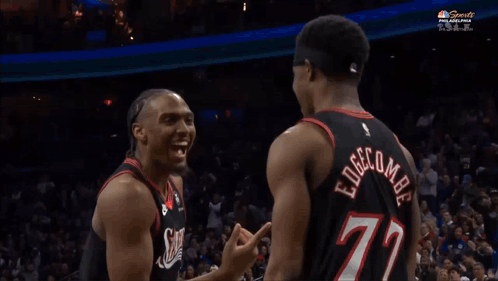 A Basketball Player With The Number 77 On His Back Is Laughing GIF