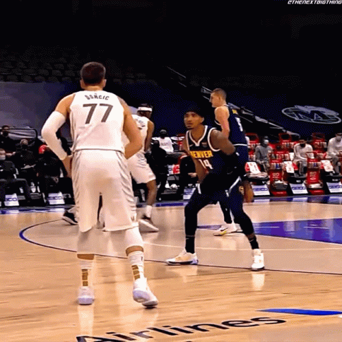 A Basketball Player With The Number 77 On His Shirt GIF