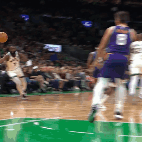 A Basketball Player With The Number 8 On His Back GIF