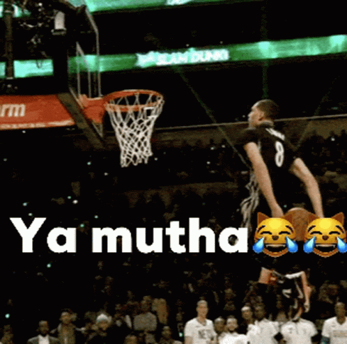 A Basketball Player With The Number 8 On His Jersey Is Jumping In The Air To Dunk The Ball GIF