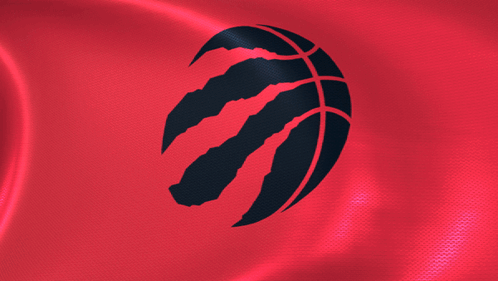 A Basketball With A Claw On It Is On A Red Cloth GIF