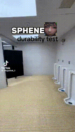 A Bathroom With Urinals And A Sign That Says ' Sphene Durability Test ' On It GIF