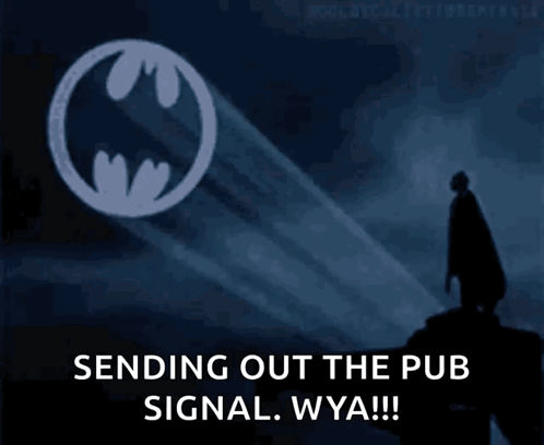A Batman Logo Is Projected On A Dark Background And Says Sending Out The Pub Signal Wya !!! GIF
