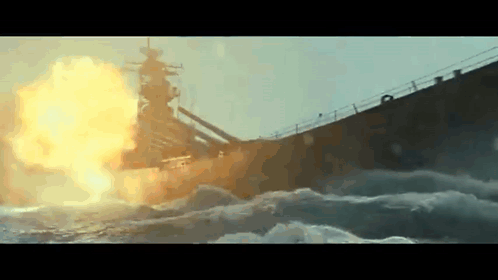 A Battleship Is Exploding In The Ocean . GIF
