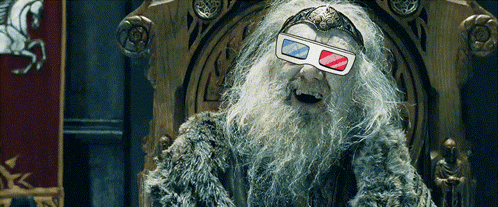 A Bearded Man Wearing 3D Glasses Sitting On A Throne GIF
