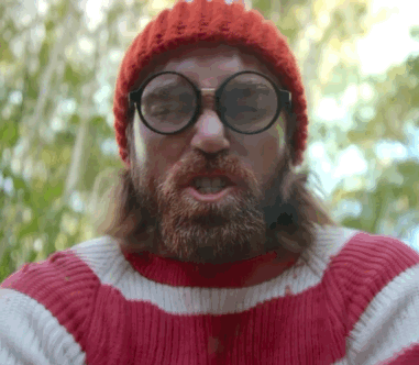 A Bearded Man Wearing Glasses And A Red Hat GIF