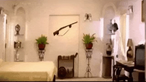 A Bedroom With A Bed And A Rifle On The Wall GIF