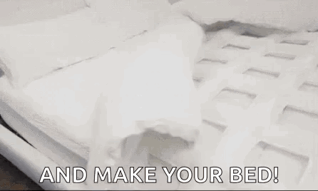 A Bedroom With A Bed And The Words `` And Make Your Bed '' Written On It . GIF