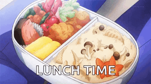 A Bento Box Filled With A Variety Of Food And The Words Lunch Time Written On It . GIF