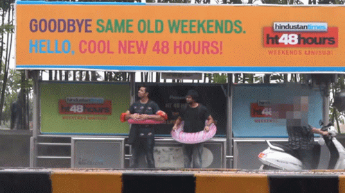 A Billboard That Says Goodbye Same Old Weekends GIF