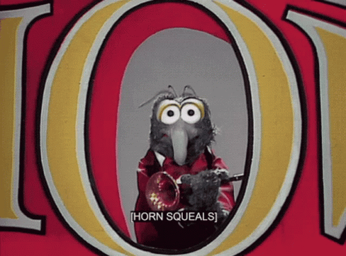 a bird playing a trumpet in front of the letter o.