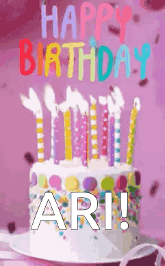 a birthday cake with candles and the words happy birthday ari written on it