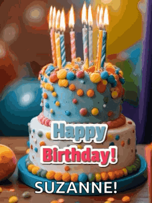 a birthday cake with candles and the words happy birthday suzanne on it