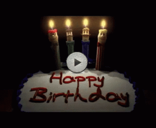 A Birthday Cake With Candles And The Words Happy Birthday Written On It GIF