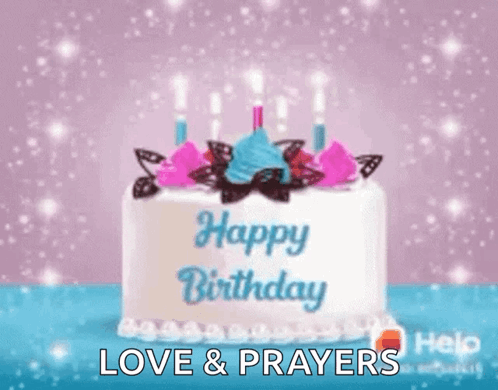 A Birthday Cake With Candles On It And The Words `` Happy Birthday Love And Prayers '' Written On It . GIF