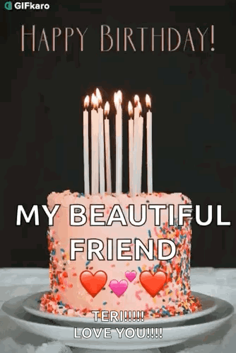 A Birthday Cake With Candles On It Is On A Plate On A Table . GIF