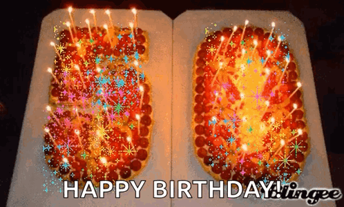 A Birthday Cake With The Number 50 On It GIF