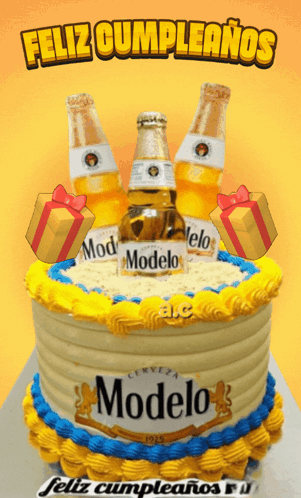 a birthday cake with three bottles of modelo on top