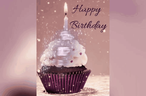 A Birthday Card With A Cupcake With A Lit Candle GIF