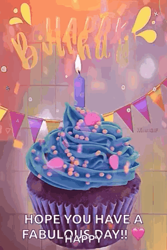 A Birthday Cupcake With Blue Frosting And A Candle GIF