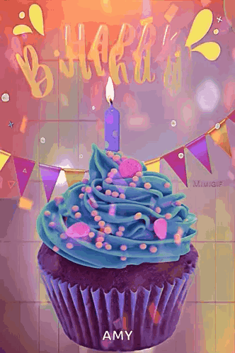 A Birthday Cupcake With Blue Frosting And A Lit Candle On Top GIF