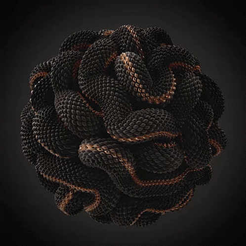 A Black And Gold Sphere With A Snake Skin Texture GIF