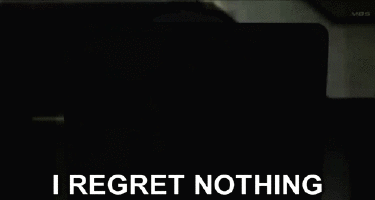 A Black And White Anime Character With The Words I Regret Nothing GIF