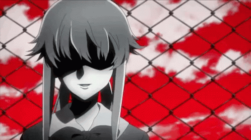 A Black And White Anime Girl Is Standing In Front Of A Chain Link Fence With Her Eyes Covered . GIF