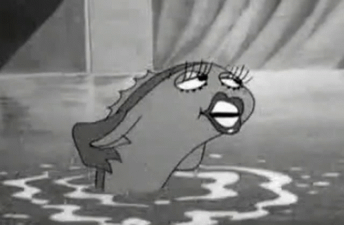 A Black And White Cartoon Of A Fish With A Woman 'S Face Is Swimming In The Water . GIF