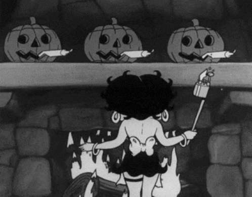 A Black And White Cartoon Of Betty Boop Standing Next To A Fireplace GIF