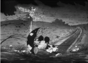 A Black And White Cartoon Of Mickey Mouse And Minnie Mouse Holding An Umbrella In Front Of A Windmill . GIF