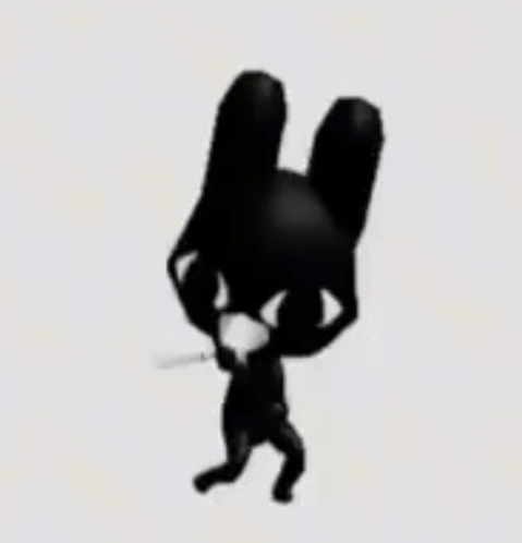 A Black And White Cartoon Rabbit Is Standing On Its Hind Legs . GIF