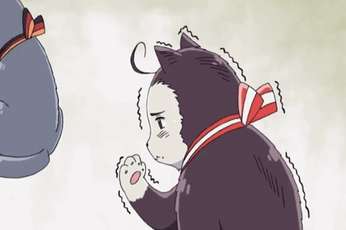 A Black And White Cat With A Red Bow Around Its Neck Is Standing Next To Another Cat GIF