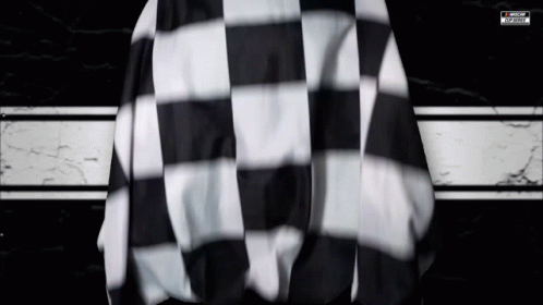 A Black And White Checkered Flag With A Nascar Logo On The Bottom GIF