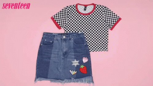A Black And White Checkered Shirt And A Blue Denim Skirt Are On A Pink Background GIF