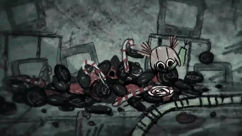 a black and white drawing of a girl laying on a pile of candy canes